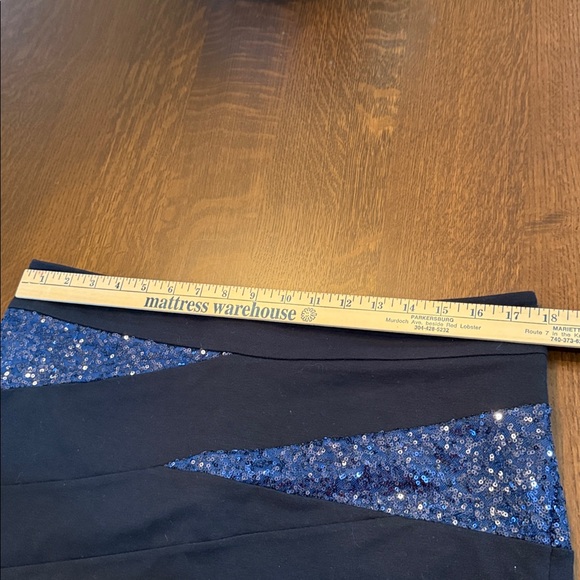 Express NWT black mini skirt with blue sequin panels
Size 12 sparkle metallic - Picture 8 of 10